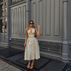 @styledsara outfit post in LPA linen midi dress