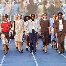 several models walk the runway during the finale of Baum und Pferdgarten's show in Copenhagen